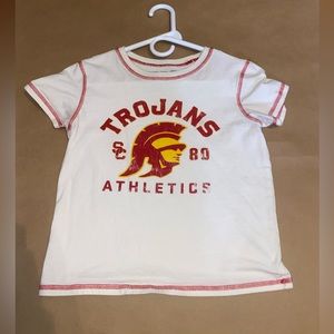 White and red baby tee with Trojan logo on the front